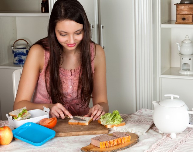 Woman making a healthy lunchbox
